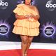 Image for article titled Lizzo carried a “bag big enough for my fucks to give” to the AMAs